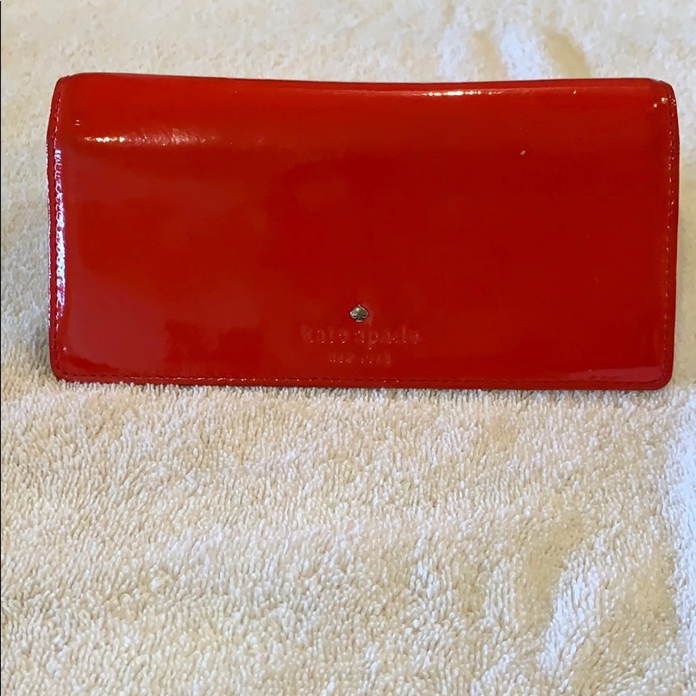 Kate Spade wallet with snap flap closure
